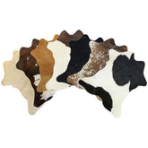 Mini Brazilian hair on cowhide rug