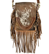 Klassy Cowgirl Brown and White Cowhide Crossbody Bag with flap and brown suede fringe